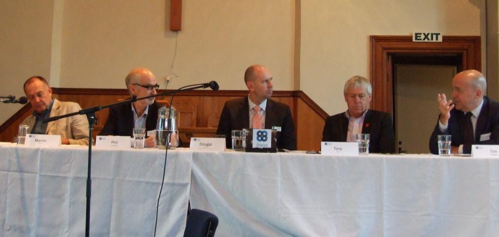 Central Otago mayoral candidate Tim Cadogan (far right) answers a question at a mayoral forum in...