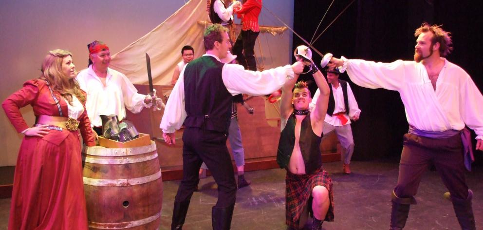  In the midst of swashbuckling action in a rehearsal for the Pirates of Penzance are (front, from left) Jules Molloy, Ron Cunningham, Nicholas Goudie, Blake Luff and Grant Radka; (back, from left) Kaidi Saw, Jackson Collier (obscured), Daniel Brannigan, J