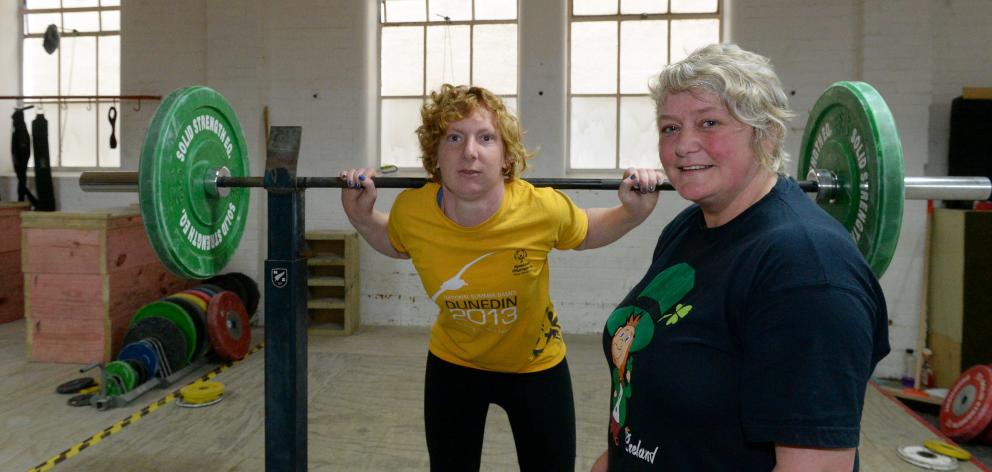 Special Olympics Otago powerlifting team member Kara Brash (left), the only female member of the...