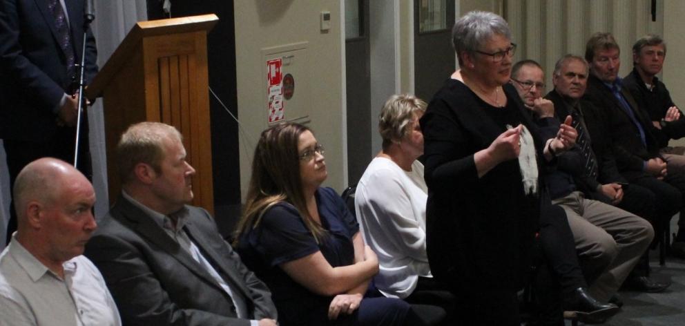 Clutha District Council candidate Alison Ludemann (standing, centre) speaks during last night's...