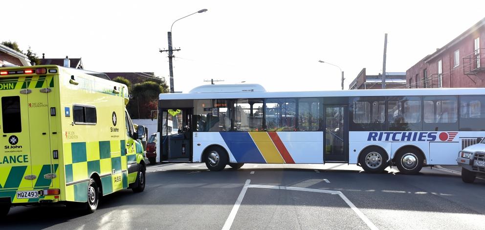 A Ritchies bus blocks South Rd in Dunedin yesterday after hitting two parked cars and a parked...