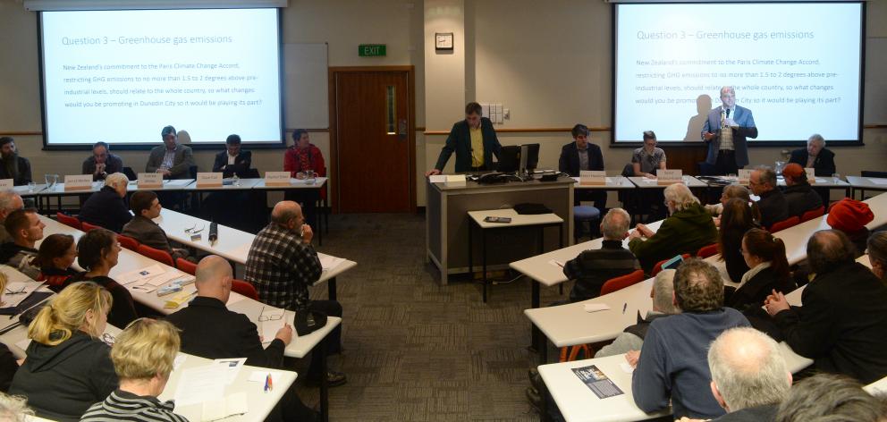 The audience listens at a forum of Dunedin mayoral candidates with (from left ) Abe Gray, Jim O'Malley, Cr Andrew Whiley, Mayor Dave Cull, Rachel Elder, meeting chairman Mark McGuire, Cr Aaron Hawkins, Scout Barbour-Evans, Barry Timmings and Athol Bayne. 