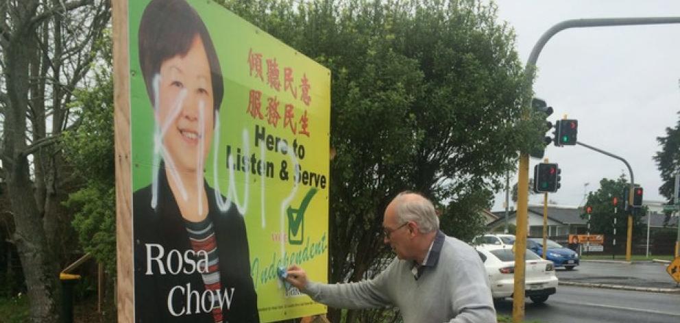A billboard for Howick local board candidate Rosa Chow was vandalised with "Kiwi?".Photo: Supplied