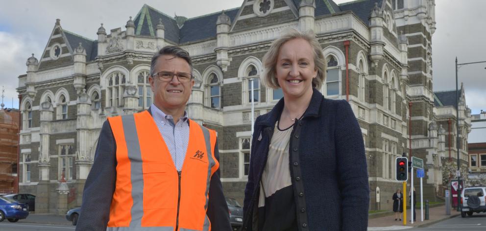 Amalgamated Builders managing director Richard Johnston and Justice Minister Amy Adams outside...