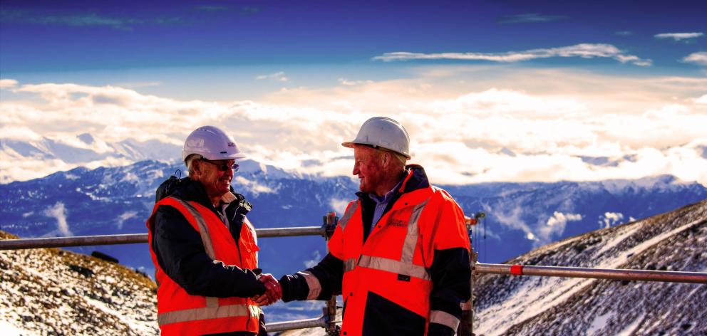 Ron Anderson and John Davies (left) onsite during the construction of  The Remarkables skifield...