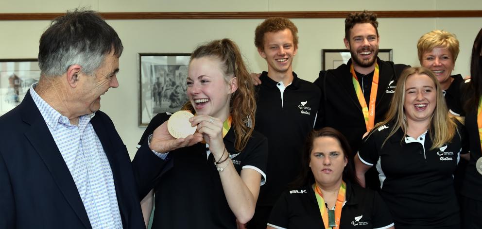 Otago's athletics Paralympians (from left) Anna Grimaldi, Jacob Phillips, Jessica Hamill, Rory McSweeney, Caitlin Dore, coach Raylene Bates and Holly Robinson met Dunedin Mayor Dave Cull (left). Photo by Peter McIntosh.