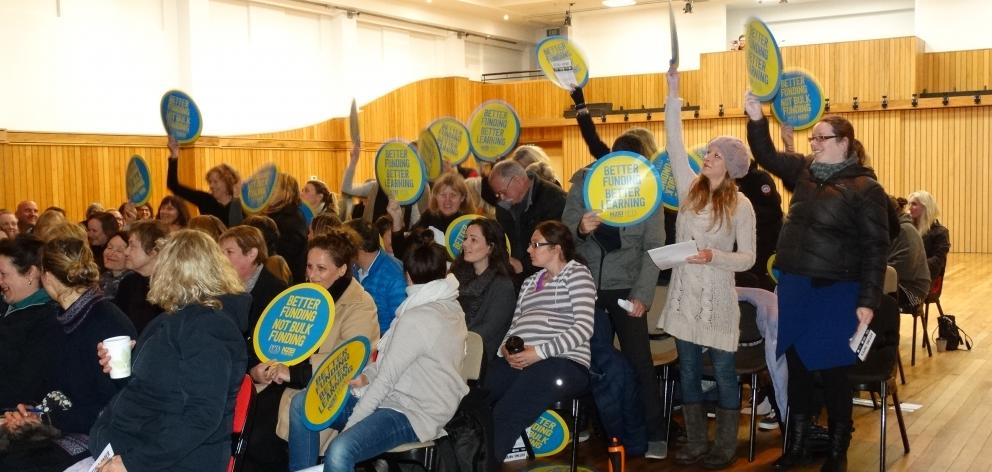 Teachers and support staff show their opposition to the Government’s lump-sum funding proposal...