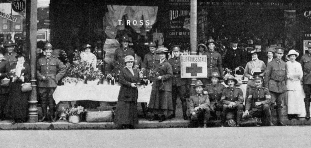 The Red Cross stall at Jacob's Corner, Dunedin, instituted by Miss K. McLean to raise funds for the Red Cross Society. - Otago Witness, 20.9.1916.