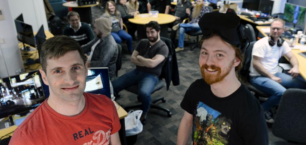 Rocketwerkz founder Dean Hall (left) and communications director Will Overgard stand in front of...
