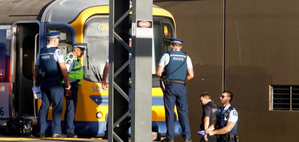Police at the Morningside train station following the fatal accident. Photo: NZ Herald