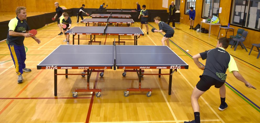 Table tennis players in action at Kaikorai Valley College on Wednesday night. Photo: Gregor...