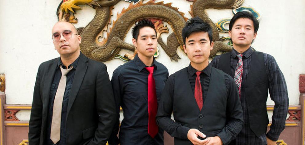 Members of the Portland, Oregon-based Asian-American rock band The Slants. Photo: Reuters