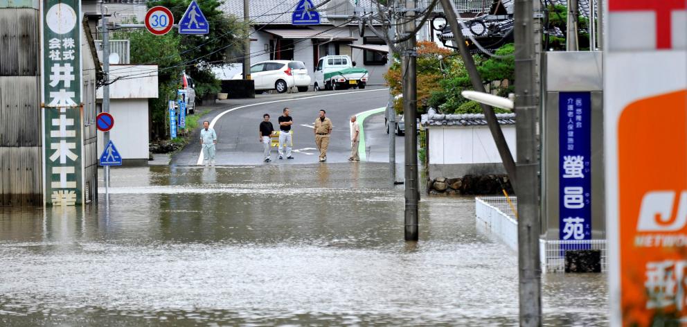 Roads are flooded due to heavy rains caused by Typhoon Malakas in Nobeoka, Japan. Photo: Reuters