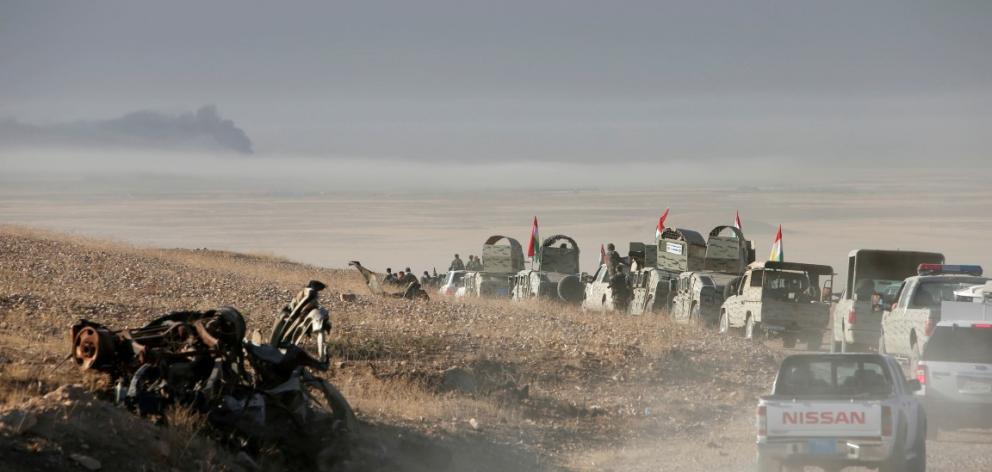 Peshmerga forces advance to attack Islamic State militants in Mosul, Iraq. Photo Reuters
