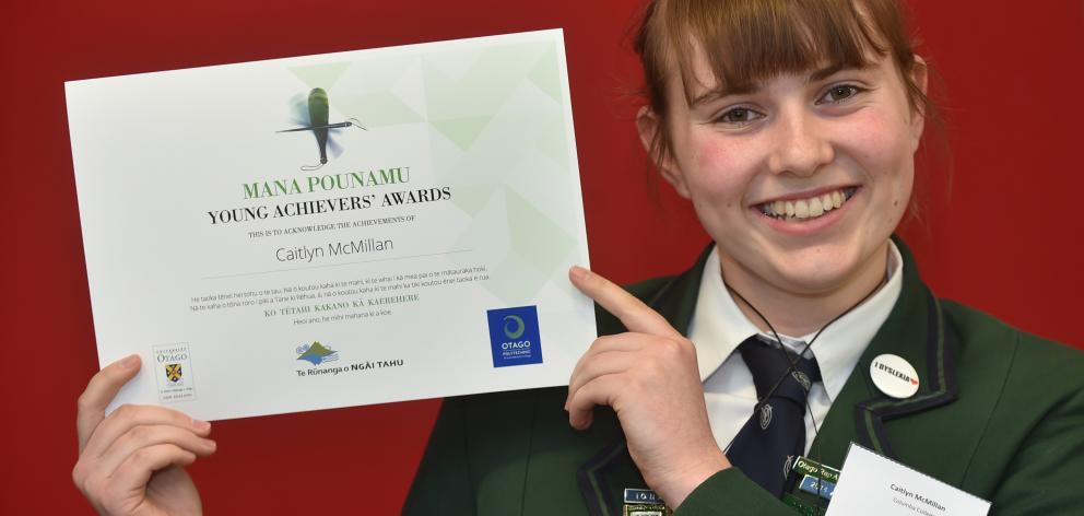Columba College year 13 pupil Caitlyn McMillan (17) holds a Manu Pounamu certificate...