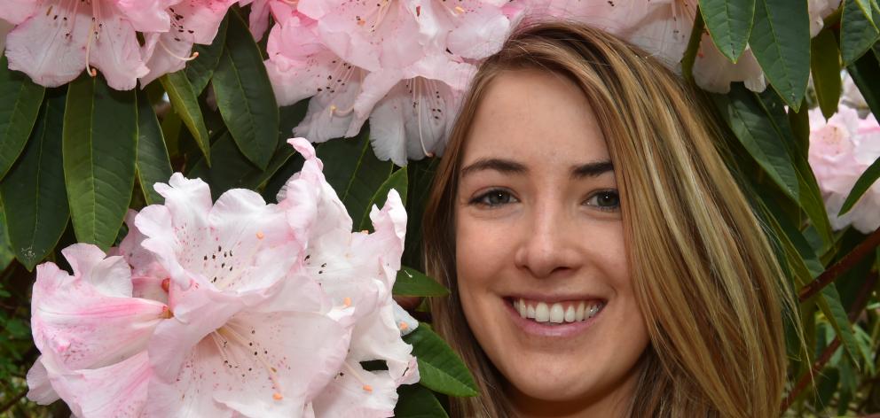 Emma Sutherland takes in the sights of spring at Dunedin Botanic Garden’s Rhododendron Day. Photo...