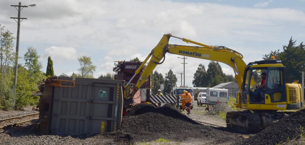 Crews spent a day and a-half clearing 250 tonnes of coal and six derailed freight wagons from...