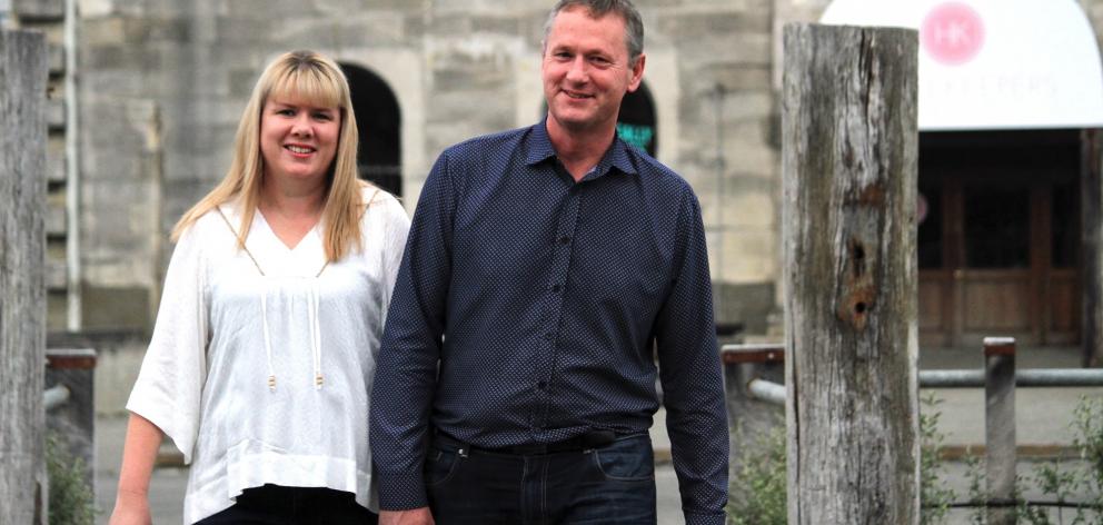 Waitaki Mayor Gary Kircher, with wife, Kerry, heads back in to his victory celebrations at the...