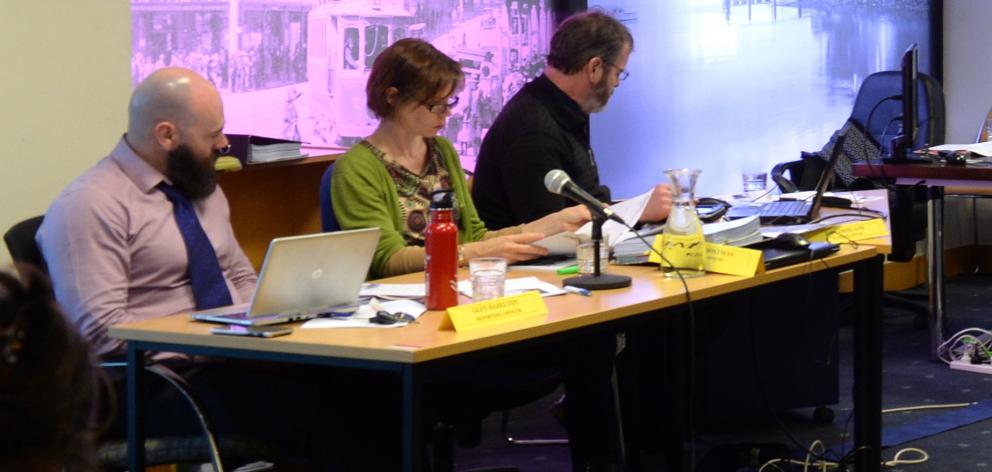 Council planners (from left) Glen Hazelton, Emma Christmas and Paul Freeland listen to a...