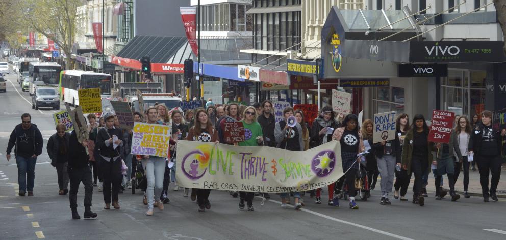 About 100 people marched down George St to the Octagon on Saturday to mark  Rape Crisis Dunedin’s...