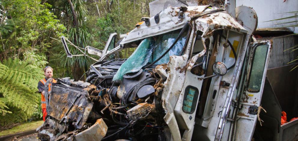 The truck crashed 40 meters down a bank while Jane Devonshire was working as a rubbish truck...