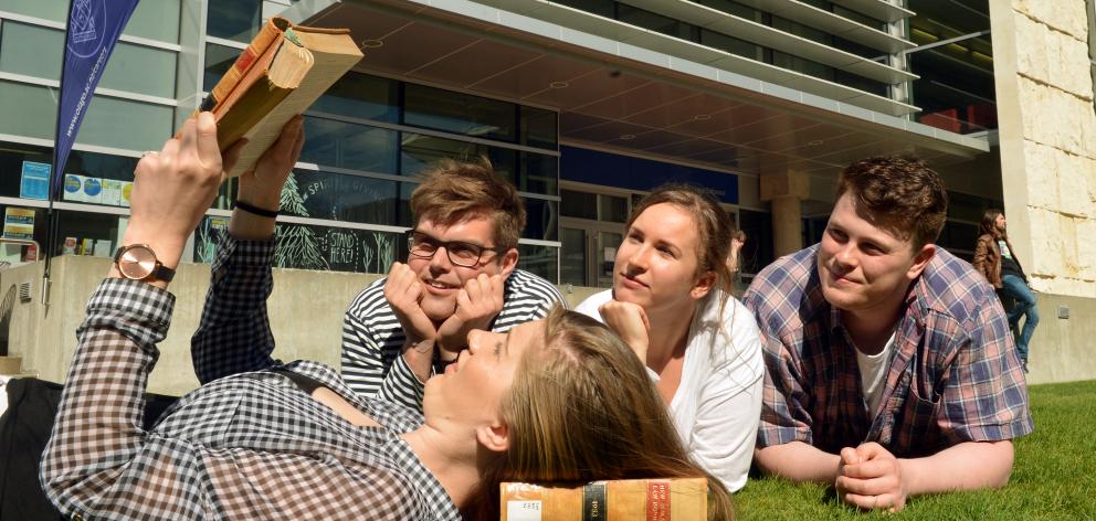 Law students cram outside the University of Otago library before today's crucial examination. Their year's work for this paper comes down to one exam. From left, Charlotte Aspin (22), Timothy Austen (21), Emily Mulvey (21) and Sean Gamble (22). Photo by S