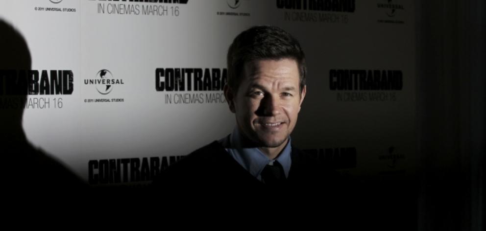 US actor Mark Wahlberg poses for a picture during a media event to promote his upcoming film ...