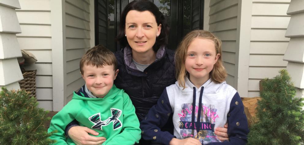 Mitchell with her children Ethan  and Amelia  at their family home in Ashburton.