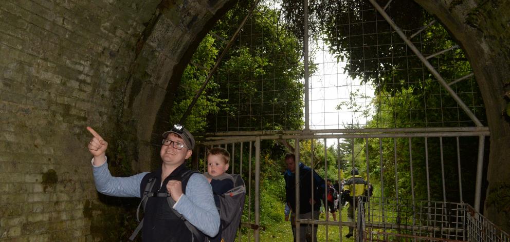 Chris and Niko (20 months) Dzikiewicz start their journey from the Wingatui end of the Chain...