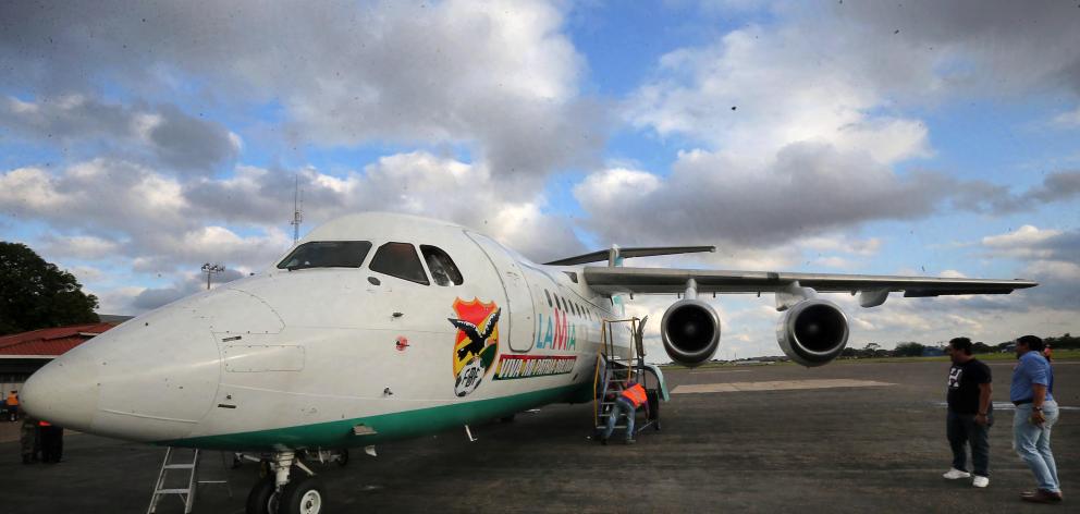 The Bolivian Lamia airlines plane which crashed this week is seen near Medellin, Colombia, in...