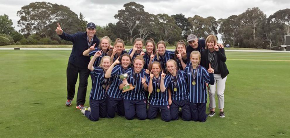 Players and staff of the St Hilda’s Collegiate First XI celebrate becoming national girls...