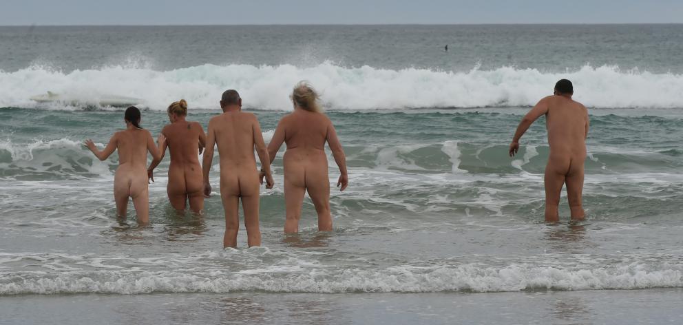 A small group of naturists brave the cold southern waters at St Kilda Beach yesterday for the Southern Free Beaches 5th Annual Mid-Summer Skinny Dip. Free Beaches New Zealand Inc is a society that defends the rights of skinny dippers and beach naturists. 