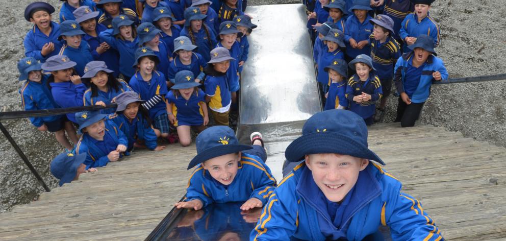 Papakaio School pupils Charlotte Elliot (8) and Eric Strachan (7) take a turn down the school’s...