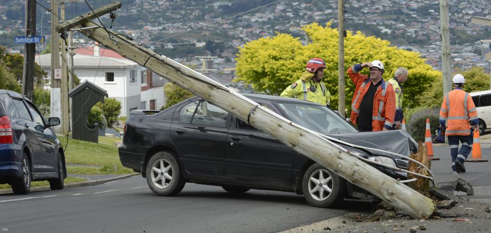 A power pole in Dunedin was felled by a Nissan car in Dunedin yesterday. Photo by Gerard O'Brien.