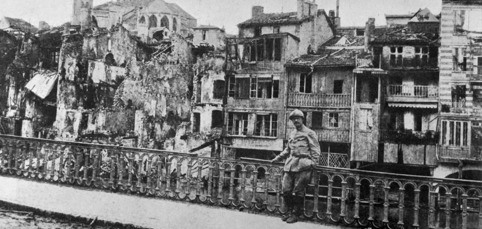 The effects of German bombardment on a picturesque corner of the town of Verdun. — Otago Witness,...