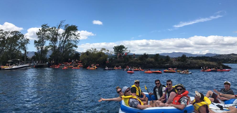 People who attended the Ruby Island party on Thursday start paddling back to Wanaka  in...