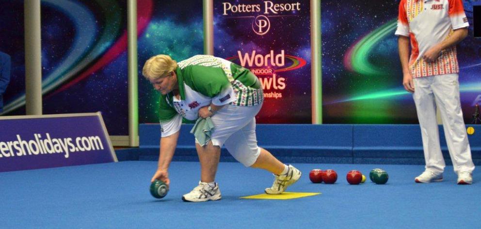 Debbie Wilford delivers a bowl in the first round of the PBA world indoor singles final in...