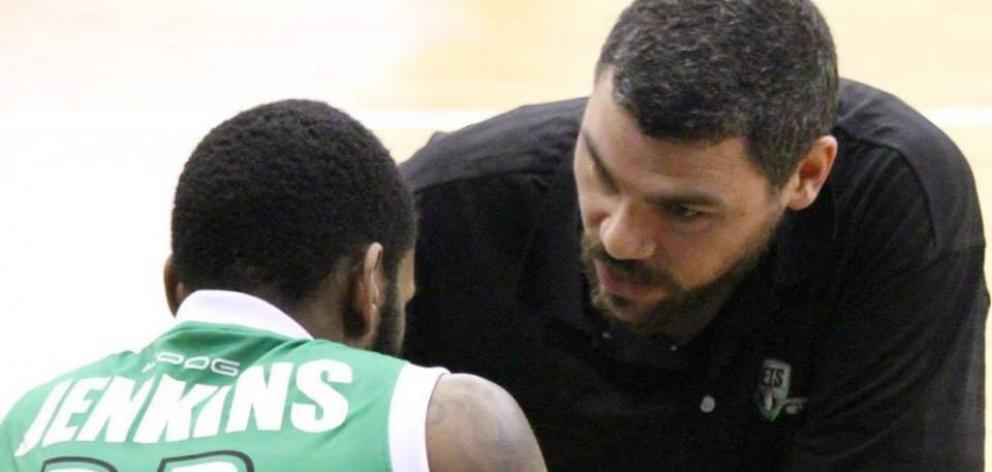 Pearce gives Jets player Brandon Jenkins some advice during an NBL game in 2015. Photos: supplied...