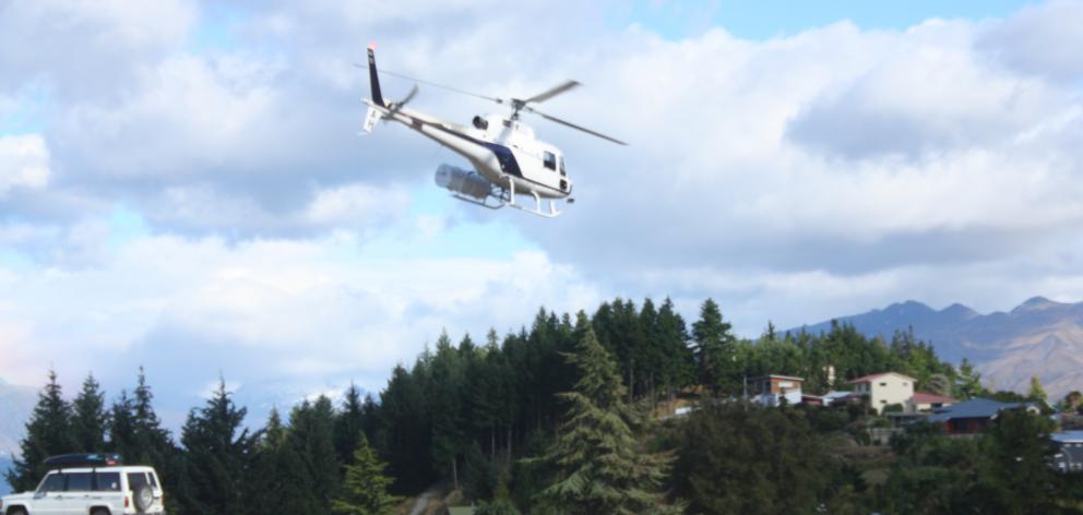 A team from LandSAR Wanaka and a helicopter from Aspiring Helicopters has been sent to the Five Passes Route after a personal locator beacon was activated. Photo: Tim Miller