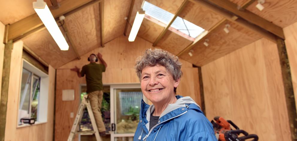 Caselberg Trust member Lesley Hirst inside The Charles Brasch Artist’s Studio in Broad Bay, as...