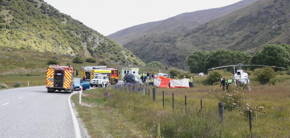 Emergency services attend the scene where a motorcyclist died after a collision with a vehicle on...