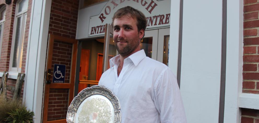 Nigel Woodhead, of Milton,  displays the Young Farmer  Otago-Southland regional final plate he...