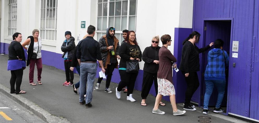 Staff arrive for a meeting at Cadbury's in Dunedin yesterday. Photo ODT