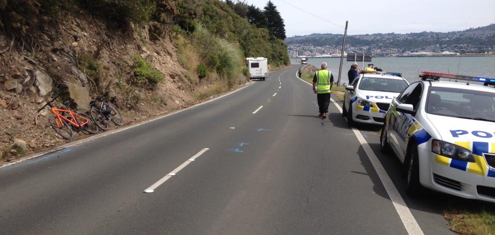 Police interview people after a campervan and cyclist collided in Dunedin today. Photo: Shawn McAvinue Police interview people after a campervan and cyclist collided in Dunedin today. Photo: Shawn McAvinue