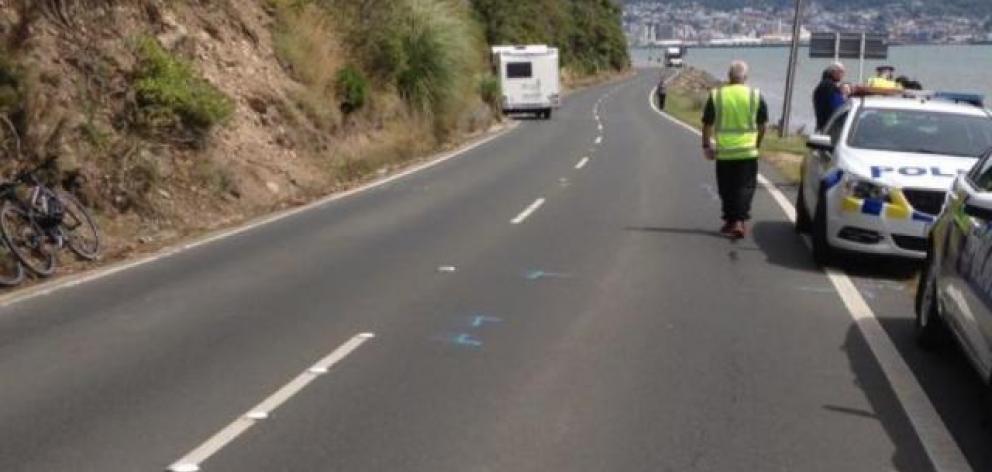 Police at the scene after tourist Wei Zhang’s campervan clipped the bicycle being ridden by...