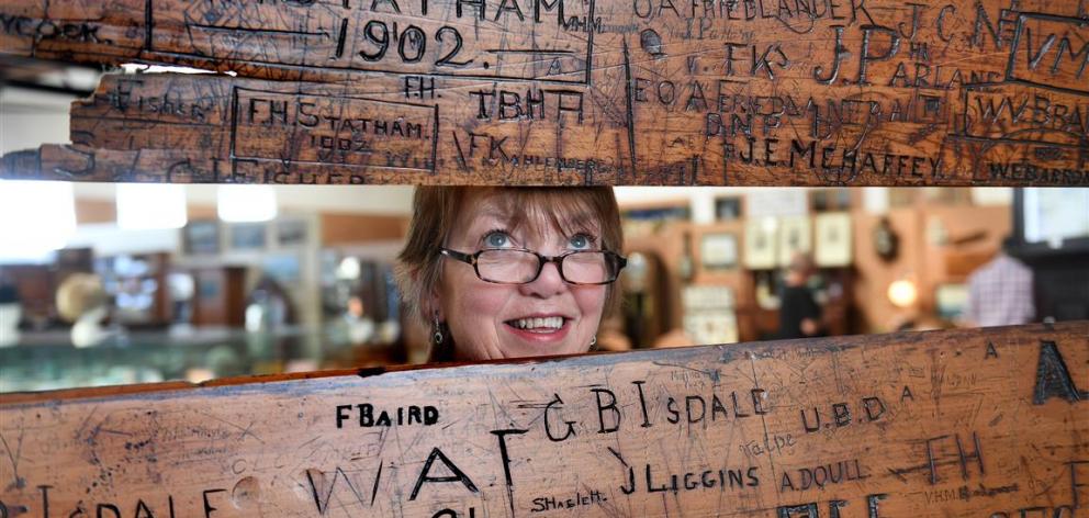  Lyn McCarthy, of Hayward's Auction House, with sections of old University of Otago lecture...