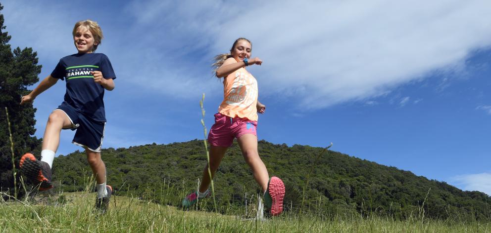 Siblings Eleanor (12) and Charlie (10) Baldi, of Dunedin, were the first up and down Saddle Hill...