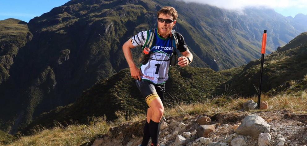  Sam Clark , of Whakatane, is high among the hills in last year’s Coast to Coast event. Photo:...