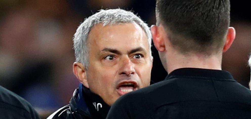 Manchester United manager Jose Mourinho remonstrates with referee Michael Oliver after the match....