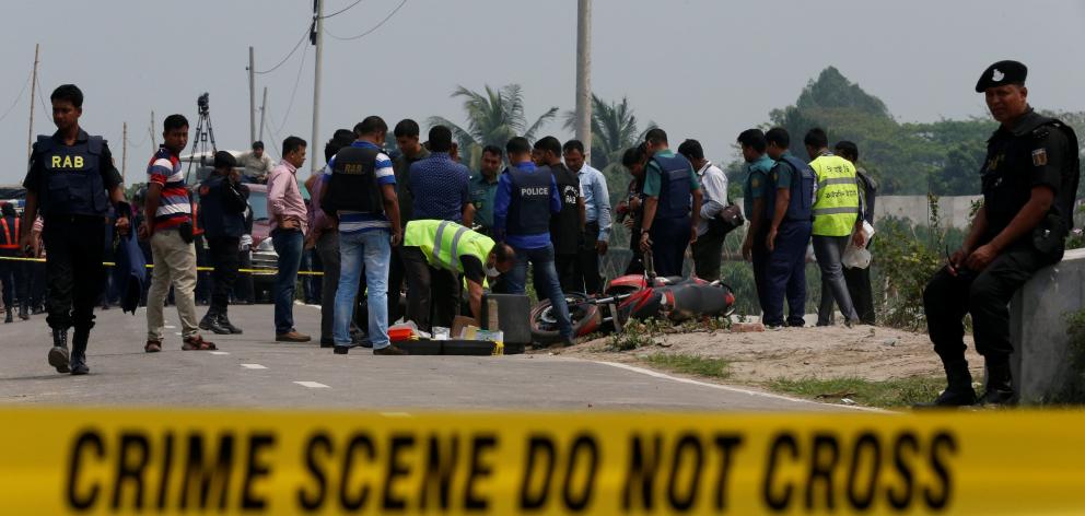 Bangladesh police shot a motorcyclist carrying explosives. Photo: Reuters